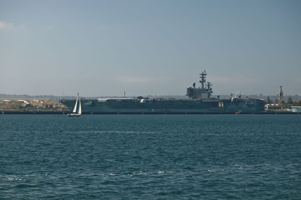 Aircraft carrier with boom